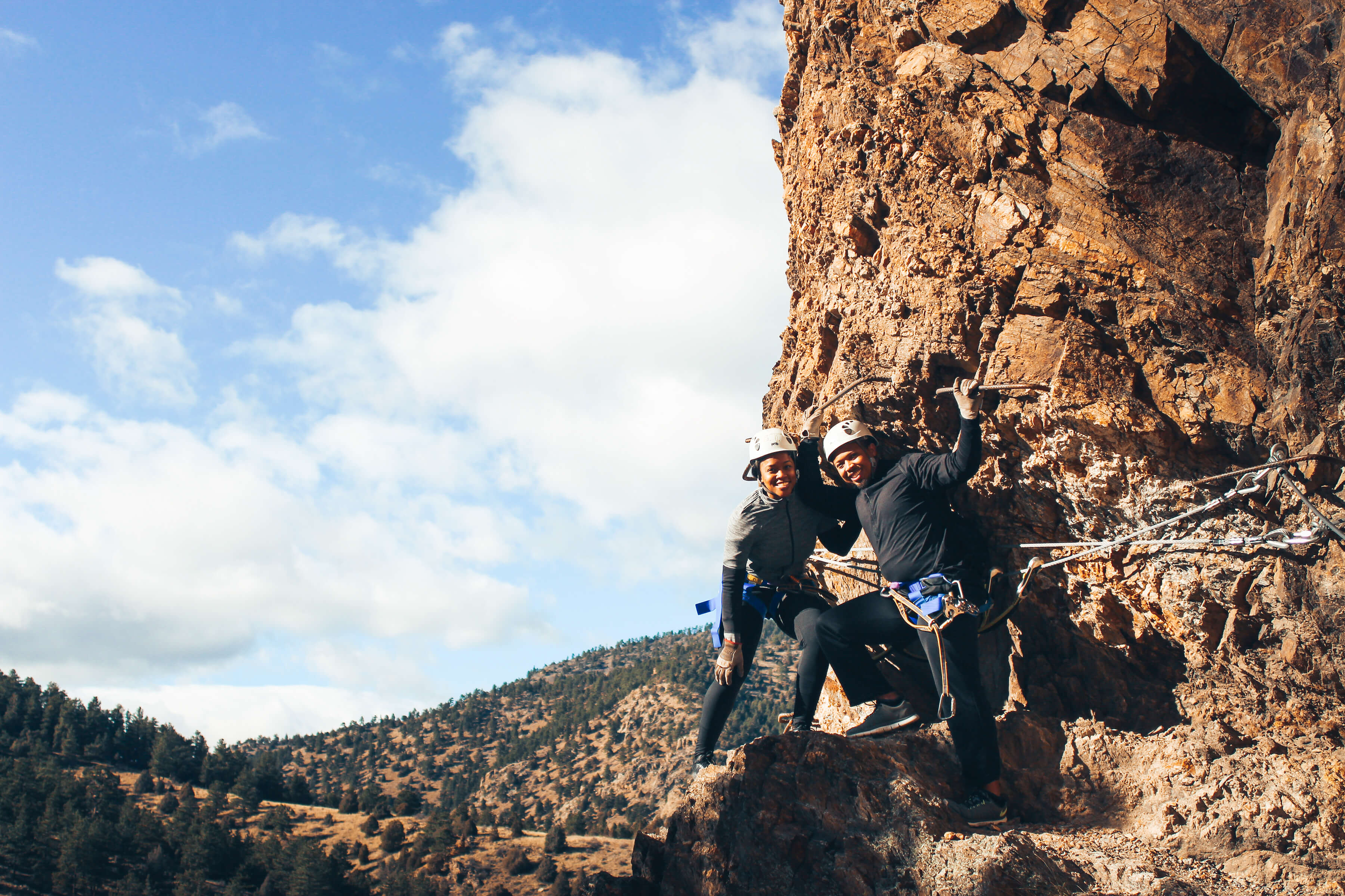 A couple of the Mt Evans via ferrata in Idaho Springs, Colorado