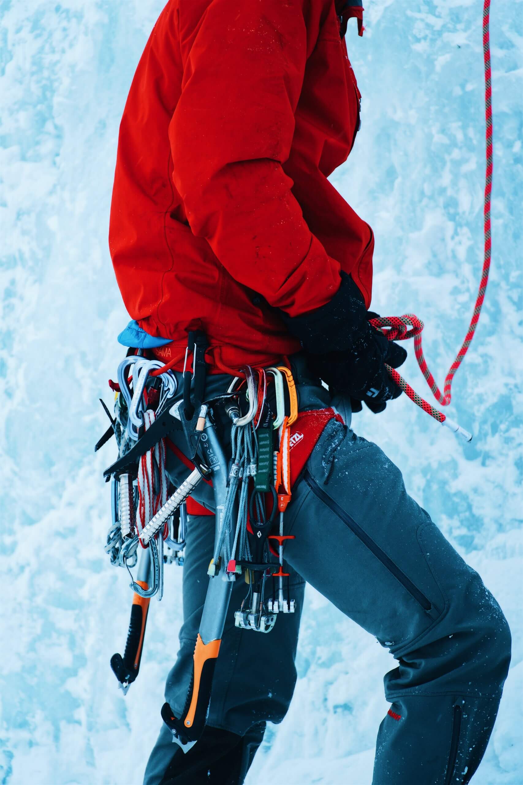 Person ice climbing with appropriate gear