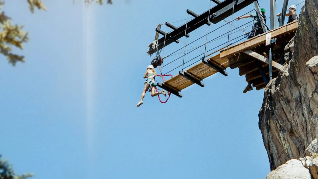 women doing Via Ferrata jump in Colorado
